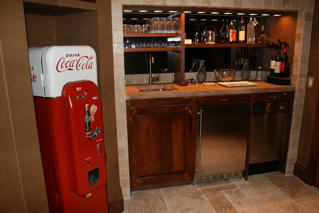 Custom bar with vintage Coca-Cola machine in home theater
