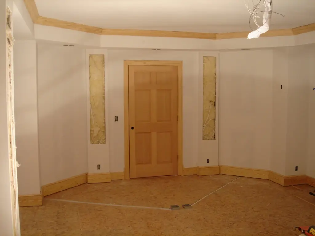 Building out a theatre room with framing and trim