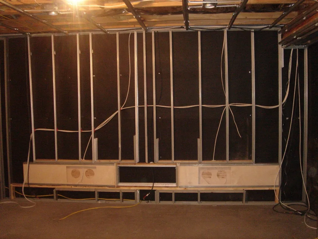 Wall framing and wiring for speaker baffles