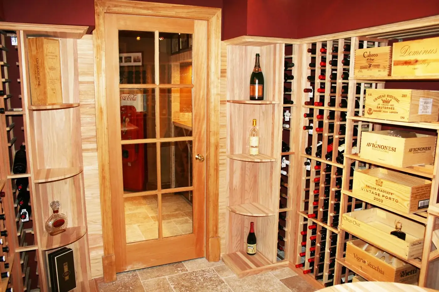 Wine cellar with glass door and display shelving